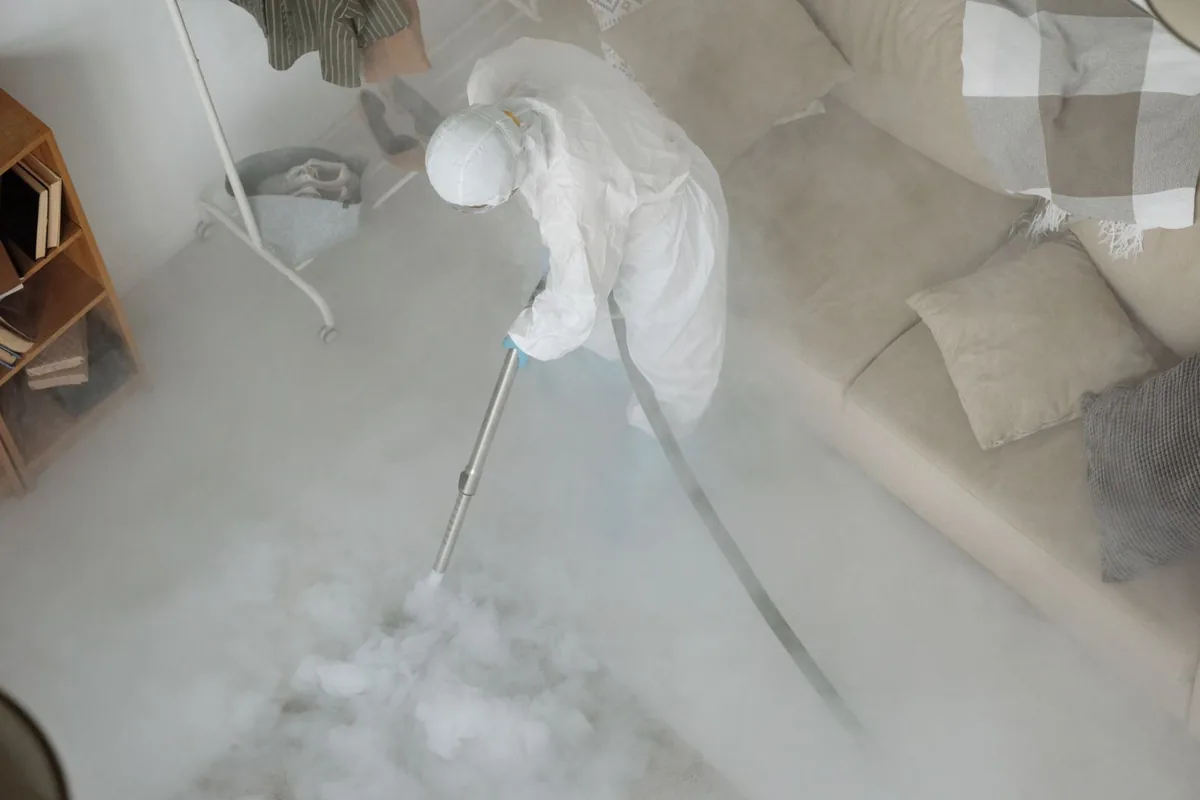 Biohazard cleanup technician in protective equipment, Brookline, Pittsburgh, PA